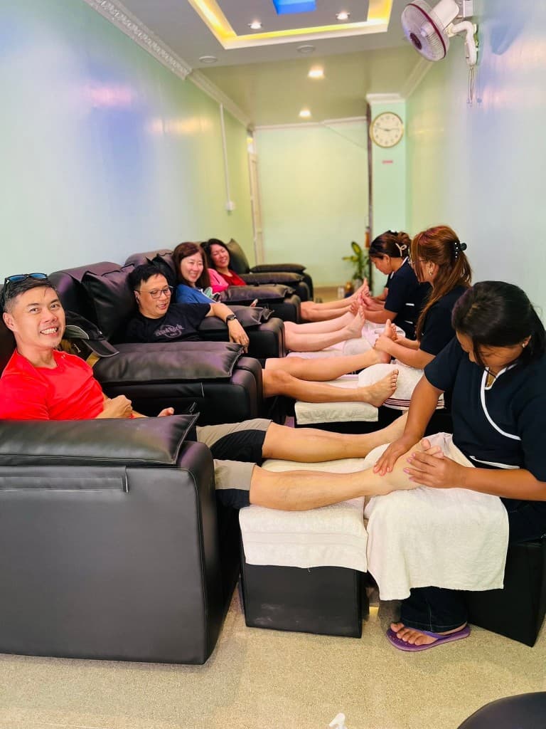 Guests enjoying foot reflexology at Green Spa Lakeside